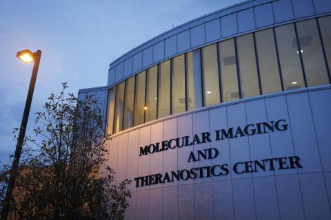 photo of the outside of the MITC building at twilight.